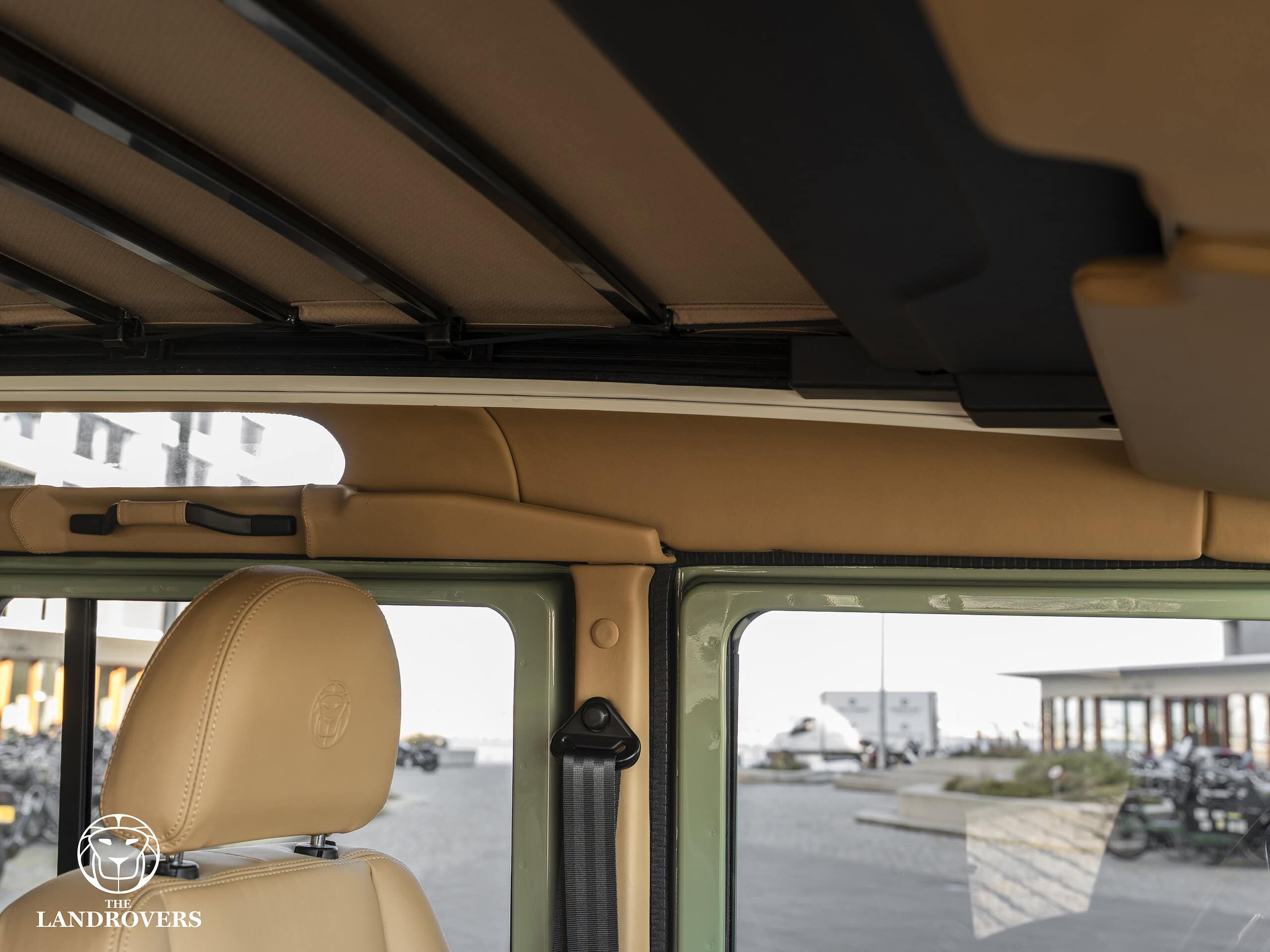 Headlining & roof mechanism